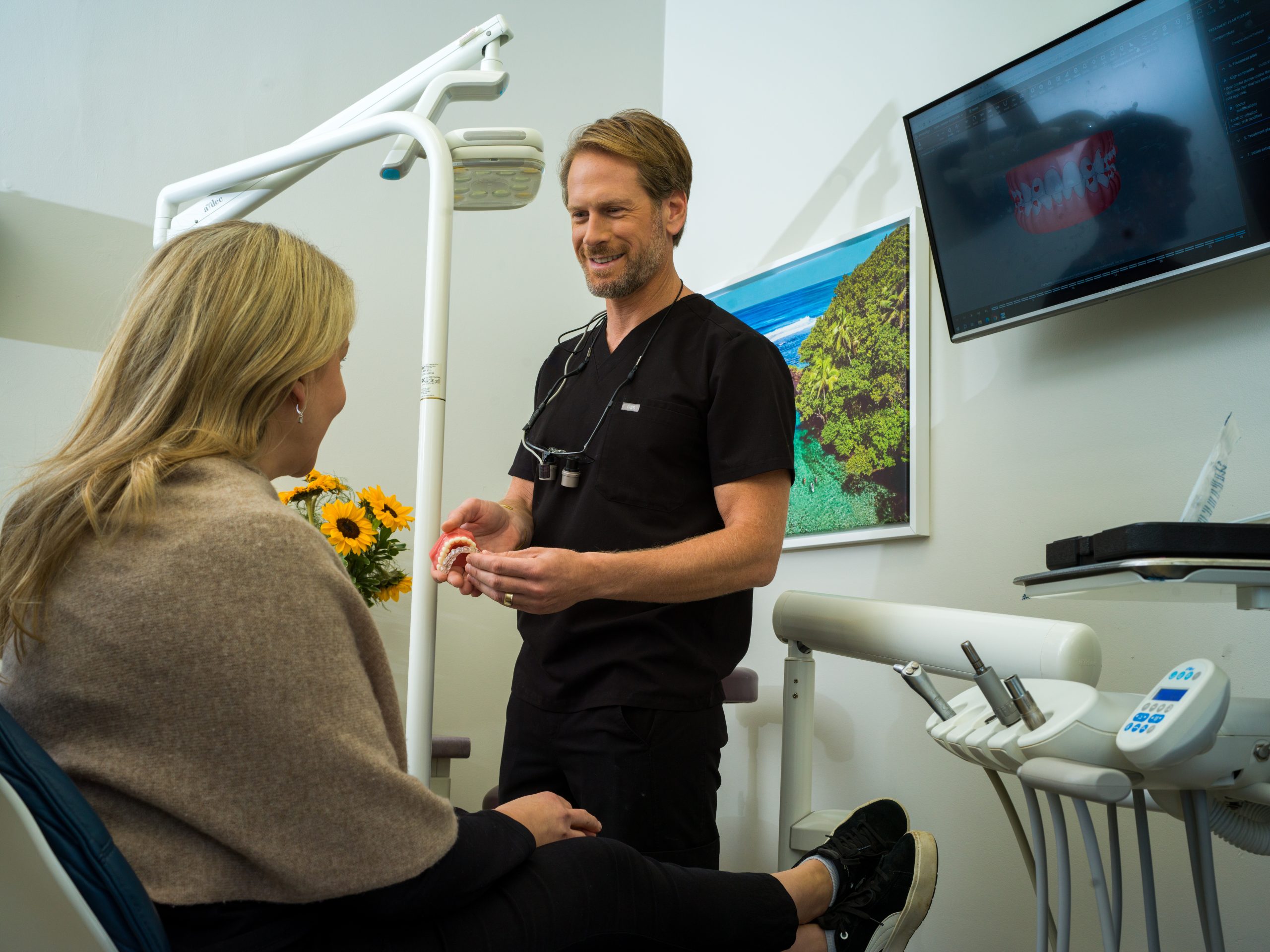 dr. darren dorfman working with a patient for invisalign